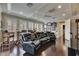 Large media room perfect for entertainment featuring home theater, plush seating, and dark floors at 624 Balibay Rd, Apollo Beach, FL 33572