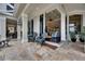 Beautiful outdoor patio with comfortable seating and seamless access to the living room at 624 Balibay Rd, Apollo Beach, FL 33572