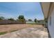 Spacious backyard features a concrete patio, grass, and a wood fence, perfect for outdoor entertaining at 6638 12Th N Ter, St Petersburg, FL 33710