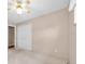 Neutral bedroom featuring a ceiling fan, plush carpeting, and a spacious closet at 6638 12Th N Ter, St Petersburg, FL 33710