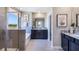 Bright bathroom featuring a large shower, double vanity, soaking tub, and modern finishes at 6745 Flint Creek Dr, Land O Lakes, FL 34638