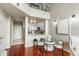 Charming dining area adjacent to an updated kitchen, featuring hardwood floors and ample natural light at 700 S Harbour Island Blvd # 105, Tampa, FL 33602