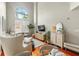 Spacious living room featuring a large window, stylish furniture, and hardwood floors at 700 S Harbour Island Blvd # 105, Tampa, FL 33602