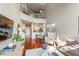Cozy living room with a loft view, featuring hardwood floors, modern furniture, and ample natural light at 700 S Harbour Island Blvd # 105, Tampa, FL 33602