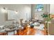Elegant living room with high ceilings, large window, and sophisticated decor at 700 S Harbour Island Blvd # 105, Tampa, FL 33602