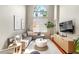 Bright living room with a large window, comfortable seating, and modern decor at 700 S Harbour Island Blvd # 105, Tampa, FL 33602