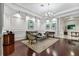 This welcoming living room features sophisticated furnishings, dark hardwood floors and plenty of natural light at 700 S Harbour Island Blvd # 105, Tampa, FL 33602