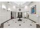 Elegant lobby with a round table, stylish lighting, and decorative wall molding at 700 S Harbour Island Blvd # 105, Tampa, FL 33602