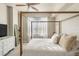 Serene main bedroom with a canopy bed, soft lighting, and neutral tones for a tranquil retreat at 700 S Harbour Island Blvd # 105, Tampa, FL 33602