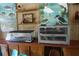 Display of animal cages and artwork in the nature center at 7334 Night Heron Dr, Land O Lakes, FL 34637