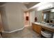 The bathroom features a double vanity with dual sinks and a glass-enclosed shower at 7334 Night Heron Dr, Land O Lakes, FL 34637