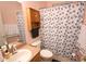 Functional bathroom with a shower/tub combo and vanity with a sink at 7334 Night Heron Dr, Land O Lakes, FL 34637