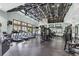 Spacious gym featuring modern exercise equipment, high ceilings, and large windows for an invigorating workout environment at 7334 Night Heron Dr, Land O Lakes, FL 34637