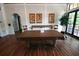 Relaxing community center recreation area with pool table, paintings, and access to the outdoor patio at 7334 Night Heron Dr, Land O Lakes, FL 34637