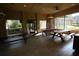 Community pavilion with picnic tables, wood ceiling and stone columns at 7334 Night Heron Dr, Land O Lakes, FL 34637