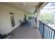 Large screened-in porch with seating and multiple access points, offering a relaxing outdoor space at 7334 Night Heron Dr, Land O Lakes, FL 34637