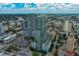 Modern high-rise apartment complex with vibrant city surroundings and clear sky at 777 N Ashley Dr # 1011, Tampa, FL 33602