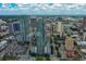 Modern high-rise apartment complex with vibrant city surroundings and clear sky at 777 N Ashley Dr # 1011, Tampa, FL 33602