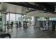 Fully equipped gym with modern machines and scenic city views at 777 N Ashley Dr # 1011, Tampa, FL 33602