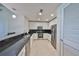 Bright, modern kitchen features stainless steel appliances, tiled backsplash, and ample cabinetry at 777 N Ashley Dr # 1011, Tampa, FL 33602