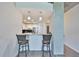 Partial view of a modern kitchen with stainless steel appliances and pendant lighting at 777 N Ashley Dr # 1011, Tampa, FL 33602