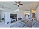 Open living area offering a view of the modern kitchen with bar seating and concrete ceilings at 777 N Ashley Dr # 1011, Tampa, FL 33602