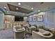 Community theater room featuring comfortable lounge seating, media console, and recessed lighting at 777 N Ashley Dr # 1011, Tampa, FL 33602