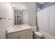 Bathroom features a full shower and tub, as well as a vanity with plenty of storage at 789 Grand Cypress Ln, Tarpon Springs, FL 34689