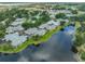 Overhead view of the community, showcasing the houses and ponds at 815 Silverthorn Ln # 0, Sun City Center, FL 33573