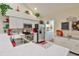 Well-lit kitchen with stainless steel appliances, white countertops, and access to the laundry room at 815 Silverthorn Ln # 0, Sun City Center, FL 33573