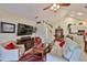 Inviting living room with a modern TV, comfortable furniture, and an open floor plan at 815 Silverthorn Ln # 0, Sun City Center, FL 33573