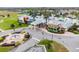 An attractive aerial view of a community center featuring a pool and a fountain at 8228 Sunlit Horizon Ln, Land O Lakes, FL 34637
