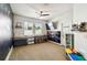Large bedroom features a custom space-themed mural, carpet floors, and ample storage at 8228 Sunlit Horizon Ln, Land O Lakes, FL 34637