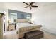 Relaxing bedroom featuring a tufted headboard bed, soft carpet, and neutral colors to promote relaxation at 8228 Sunlit Horizon Ln, Land O Lakes, FL 34637