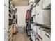 Walk-in closet with extensive shelving and organization systems, designed for maximum storage and convenience at 8228 Sunlit Horizon Ln, Land O Lakes, FL 34637