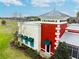 Attractive, multi-toned commercial building featuring the Fit & Flourish business at 8228 Sunlit Horizon Ln, Land O Lakes, FL 34637