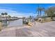 Community boat ramp with dock access on the water with beautiful blue skies in waterfront neighborhood at 8407 Granite Pl, Tampa, FL 33615