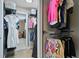 Organized walk-in closet with ample hanging space and shelving for efficient storage solutions at 8407 Granite Pl, Tampa, FL 33615