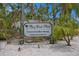 Elegant community sign for 'Bay Crest Park' highlighting the boat ramp and registration requirements at 8407 Granite Pl, Tampa, FL 33615