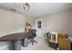 Neutral flex room featuring versatile space, modern lighting, and convenient access to the exterior at 8407 Granite Pl, Tampa, FL 33615