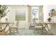 Bright home office space featuring two desks, comfortable chairs, and a serene atmosphere at 8449 Sea Ray Run, Parrish, FL 34219
