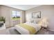 Serene bedroom with a plush bed, soft neutral tones, and a bright window overlooking the landscape at 10669 Bridgegate Heights Loop, San Antonio, FL 33576