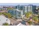 Stunning exterior view of a modern condo building featuring multiple balconies and lush green landscaping at 111 N 12Th St # 1305, Tampa, FL 33602