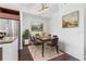 Cozy dining room features a modern table and chairs with an adjacent kitchen at 111 N 12Th St # 1305, Tampa, FL 33602