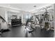 Bright gym features weight training machines, mirrored walls, and rubber flooring for safety and comfort at 111 N 12Th St # 1305, Tampa, FL 33602