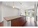 Kitchen island featuring granite countertops, a modern faucet, and a dishwasher at 111 N 12Th St # 1305, Tampa, FL 33602