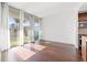 Bright living room with hardwood floors and floor-to-ceiling windows offering a vibrant outdoor view at 111 N 12Th St # 1305, Tampa, FL 33602