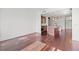 Open-concept living room showcasing gleaming hardwood floors and recessed lighting at 111 N 12Th St # 1305, Tampa, FL 33602