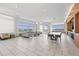 Spacious residents' lounge featuring comfortable seating, tile flooring, and expansive city views at 111 N 12Th St # 1305, Tampa, FL 33602