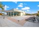 Expansive rooftop deck boasts lounge chairs, greenery, and shaded areas perfect for relaxation and entertaining at 111 N 12Th St # 1305, Tampa, FL 33602